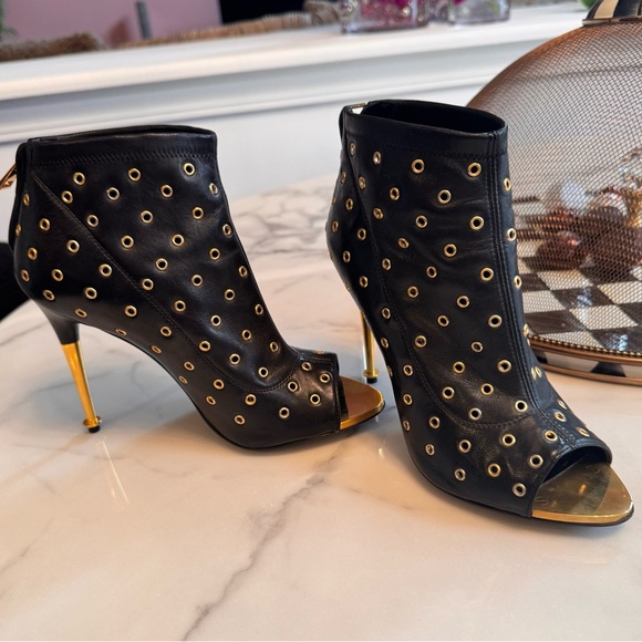 Tom Ford Black and Gold Grommet Heeled Boots with Metallic Stiletto. - Picture 7 of 7